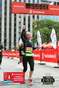 Helen at the Toronto Waterfront Marathon Finish Line!